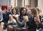 Audience Applauding Speaker After Conference Presentation