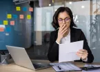 Worried person looking at business accounts 